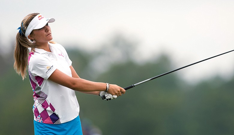 Lexi Thompson plays a tee shot during the first round of the Navistar LPGA Classic.