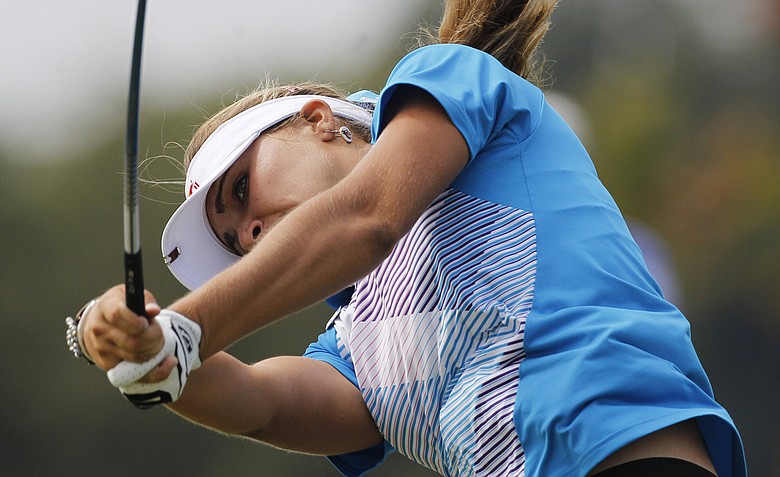Lexi Thompson hits her drive from the third tee during the final round of the Navistar LPGA Classic golf tournament at Capitol Hill at the Robert Trent Jones Golf Trail in Prattville, Ala., on Sunday.