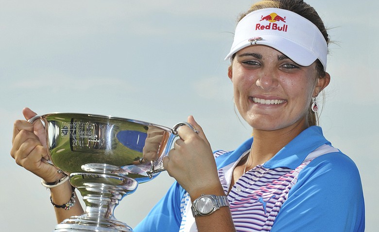 Lexi Thompson holds high her trophy after winning the Navistar LPGA Classic on the Robert Trent Jones Golf Trail at Capitol Hill in Prattville, Ala., on Sunday Sept. 18, 2011.
