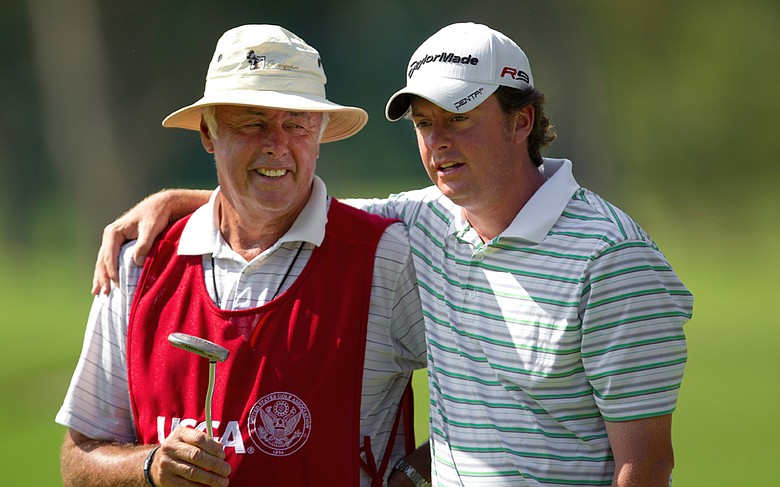 Nathan Smith (right) and his father/caddie Larry during the U.S. Mid-Amateur Championship.
