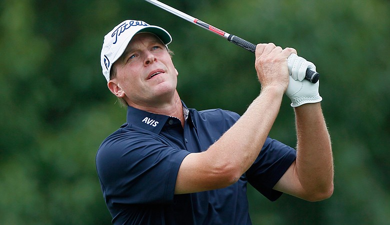 Steve Stricker watches his tee shot on the second hole during the first round of The Tour Championship at East Lake Golf Club.