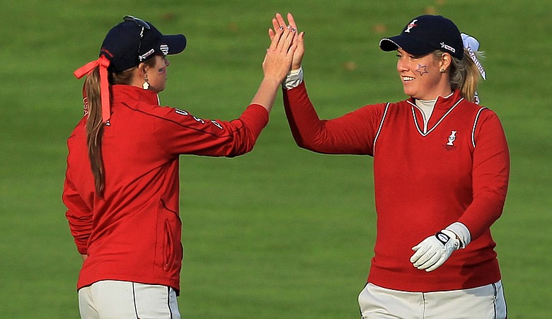 Brittany Lincicome, right, and Paula Creamer celebrate on the 16th hole during the afternoon fourballs on Day 2 of the 2011 Solheim Cup at Killeen Castle Golf Club.
