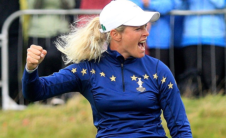 Suzann Pettersen of Europe celebrates holing a putt on the 15th green during her singles match against Michelle Wie on Day 3 of the 2011 Solheim Cup at Killeen Castle Golf Club on September 25, 2011. Pettersen would win the match 1 up.