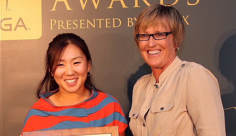 Jane Geddes, Senior VP of Tournament Operations and Player Services, (right) with In-Kyung Kim.