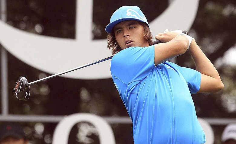 Rickie Fowler watches his shot on the 18th hole during the first round of the Korea Open at Woo Jeong Hills Country Club in Cheonan, south of Seoul, South Korea. Fowler is tied for the lead.