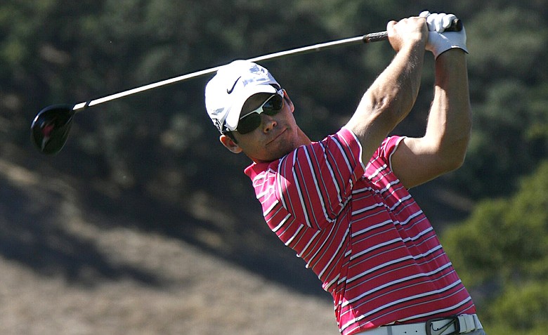 Paul Casey, of England, tees off on the ninth hole in the second round at the Frys.Com Open.