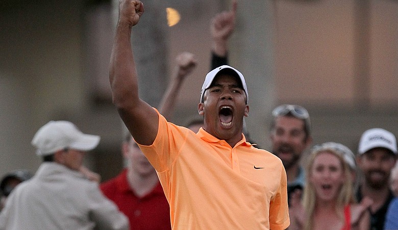 Jhonattan Vegas of Venezuela reacts after making the winning putt on the second playoff hole during the final round of the Bob Hope Classic.