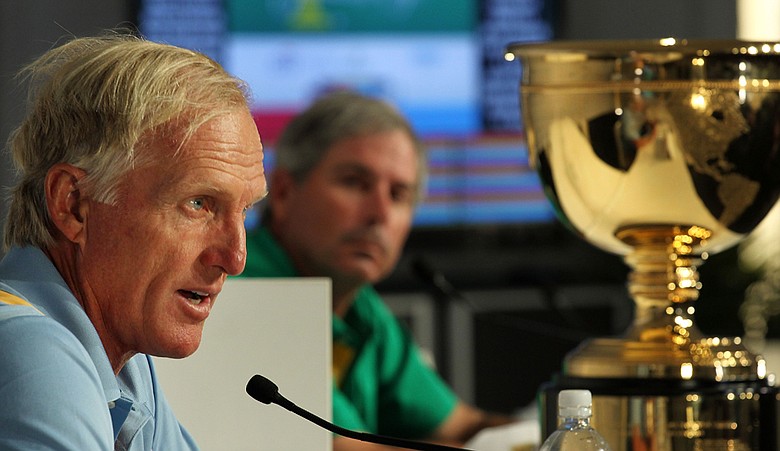 International captain Greg Norman, left, with U.S. captain Fred Couples at a Presidents Cup press conference.