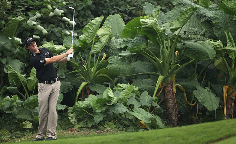 Rory McIlroy of Northern Ireland in action during the second day's foursomes during the Omega Mission Hills World Cup.
