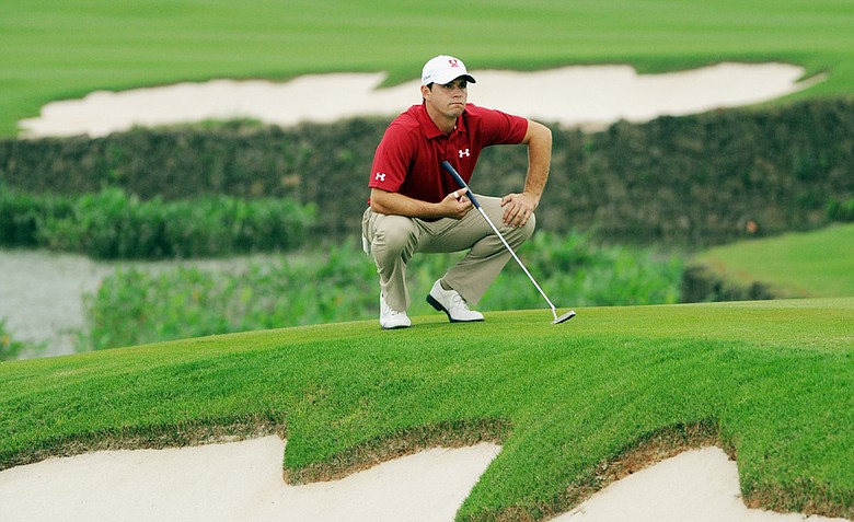 Gary Woodland, partnering with World No. 10 Matt Kuchar, lines up his putt at the 16th hole during Day 2 of the 56th World Cup of Golf. Some question why Woodland is playing in China, considering Steve Stricker and Dustin Johnson were other viable options.