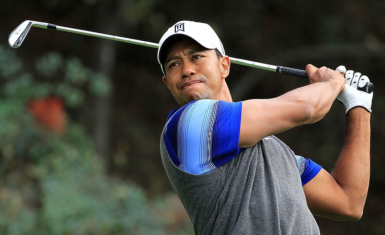 Tiger Woods watches a tee shot on the 18th hole during the second round of the Chevron World Challenge.