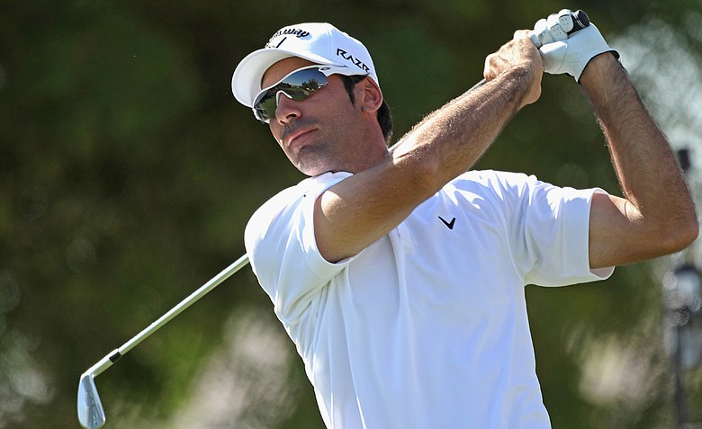Alvaro Quiros hits his tee shot on the fifth hole during the third round of the Dubai World Championship.