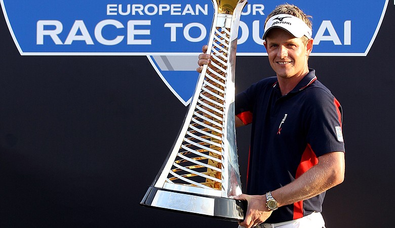 Luke Donald poses with the trophy after winning The Race To Dubai at the Dubai.