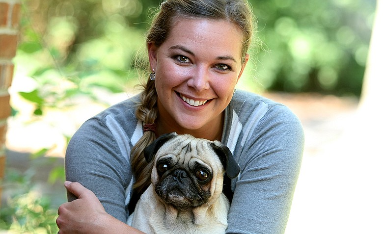 May Wood-Frederiksen photographed at her home in Nashville, TN., with one of her dogs.