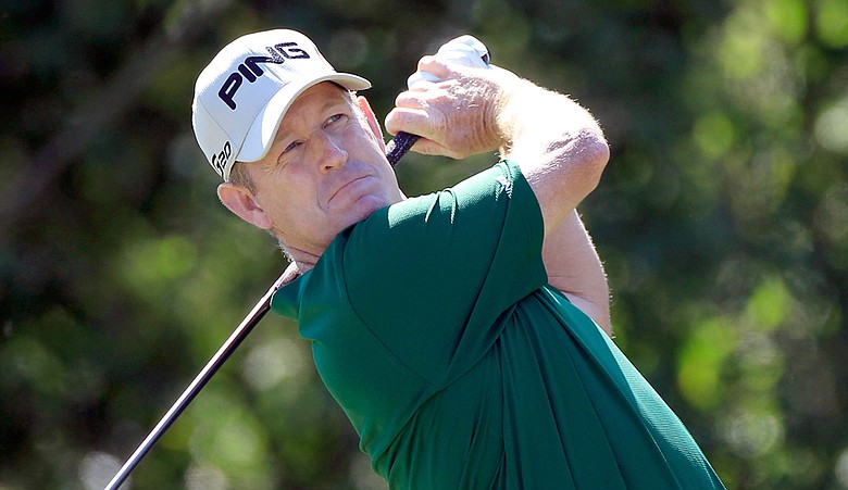 Jeff Maggert plays a shot during the third round of the Children's Miracle Network Classic at Disney's Magnolia course.