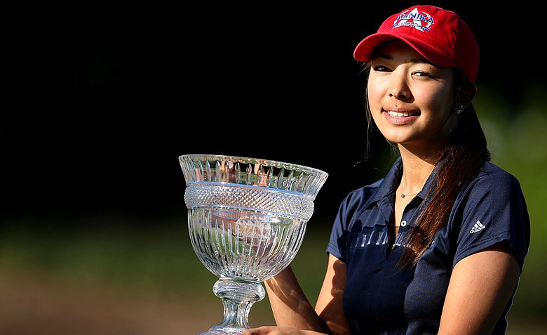 Alison Lee poses with the trophy after winning the 2012 Annika Invitational at Reunion Resort with a score of 213.