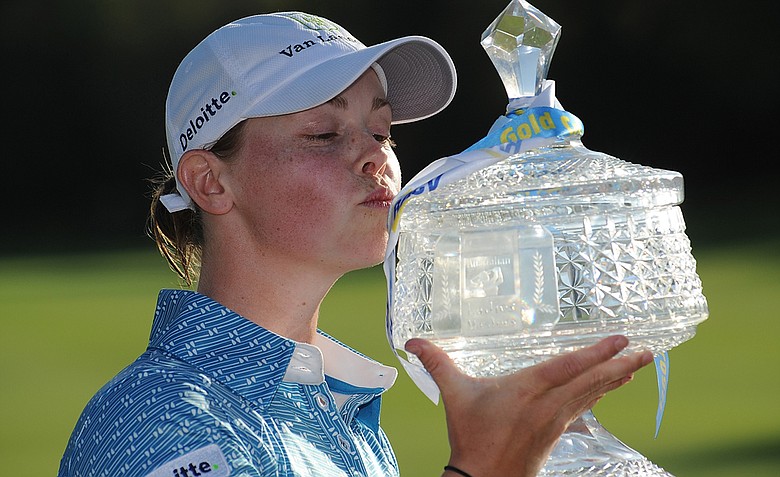 Christel Boeljon of the Netherlands poses with the winners trophy during the 2012 Ladies Masters at Royal Pines Resort.