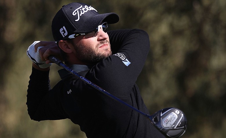 Kyle Stanley hits a tee shot on the second hole during the final round of the Waste Management Phoenix Open at TPC Scottsdale.