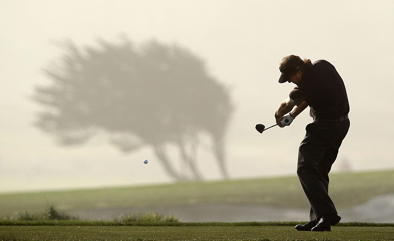 Phil Mickelson hits his tee shot on the 12th hole during the second round of the AT&T Pebble Beach National Pro-Am at the Monterey Peninsula Country Club.