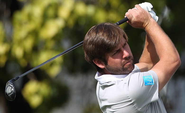 Robert Rock plays a shot during the second round of the Dubai Desert Classic.