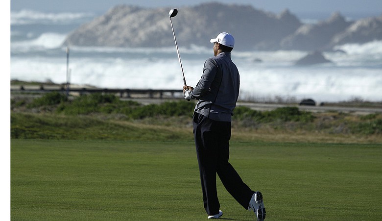 Tiger Woods hits during a practice round at the AT&T Pebble Beach National Pro-Am.