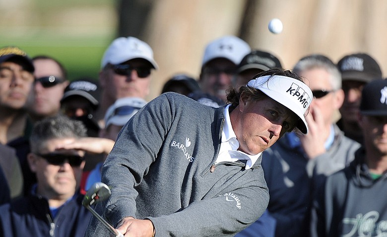 Phil Mickelson hits out of the rough on the 12th green during the second round of the Northern Trust Open.