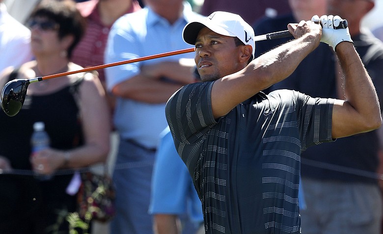 Tiger Woods hits his tee shot on the eighth hole during the second round of the World Golf Championships-Accenture Match Play Championship.