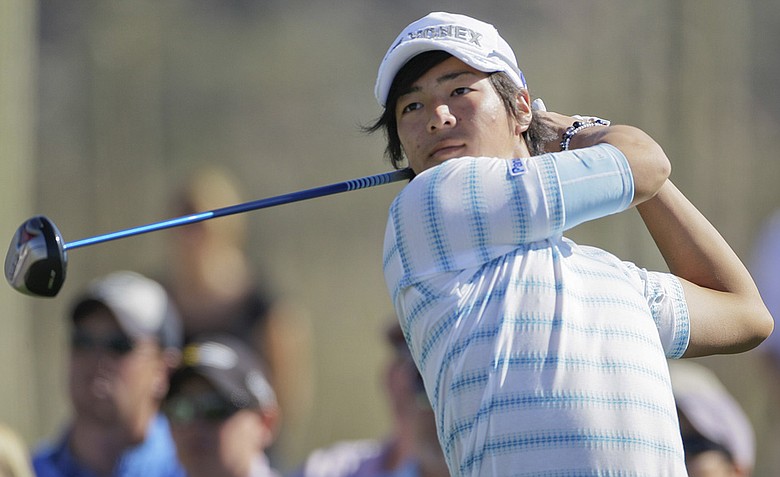 Ryo Ishikawa, of Japan, tees off on two while playing Paul Lawrie during the Match Play Championship.