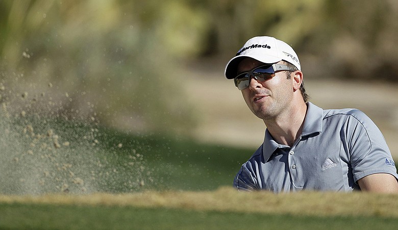 Scotland's Martin Laird hits out of the bunker during the third round of the WGC-Match Play Championship.