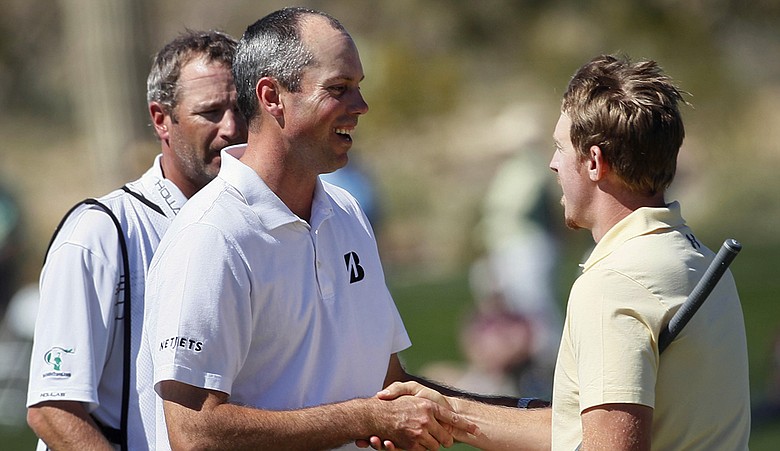 Matt Kuchar congratulates Hunter Mahan after Mahan won their quarterfinal match during the WGC-Match Play Championship.