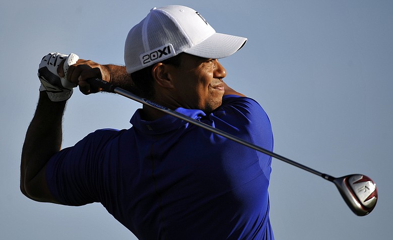 Tiger Woods tees off on the 13th hole during the second round of the Honda Classic golf tournament in Palm Beach Gardens, Fla.