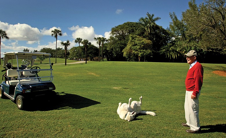 Pete Dye and his German shepherd Sixty at Gulf Stream Golf Club in Delray Beach, Fla.