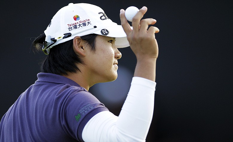Yani Tseng reacts to the crowd after finishing on the 18th hole during the third round of the Kia Classic.