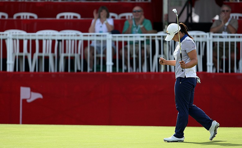 Amy Yang makes her putt at No. 18 carding a 66 onThursday at the Kraft Nabisco Championship.