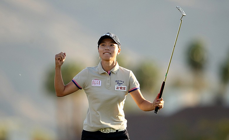 Sun Young Yoo celebrates after winning in a playoff during the final round of the Kraft Nabisco Championship.