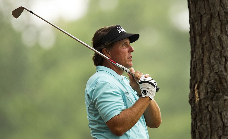 Phil Mickelson of the US on the 9th fairway during a practice round before the 2012 Masters Golf Tournament at Augusta National.