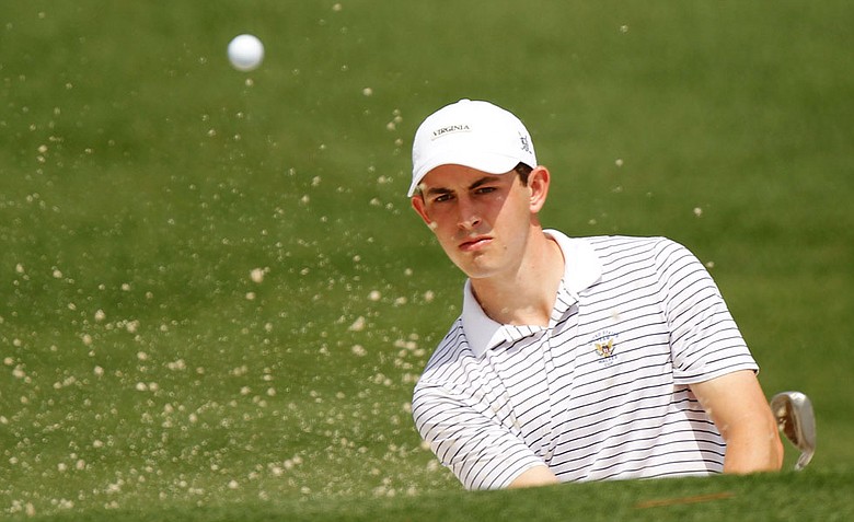 Patrick Cantlay hits a shot out of the bunker on the second hole during the first round of the 2012 Masters.