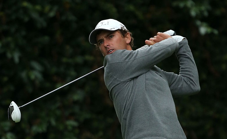 Charles Howell III of the United States hits his tee shot on the second hole during the second round of the 2012 Masters Tournament at Augusta National.
