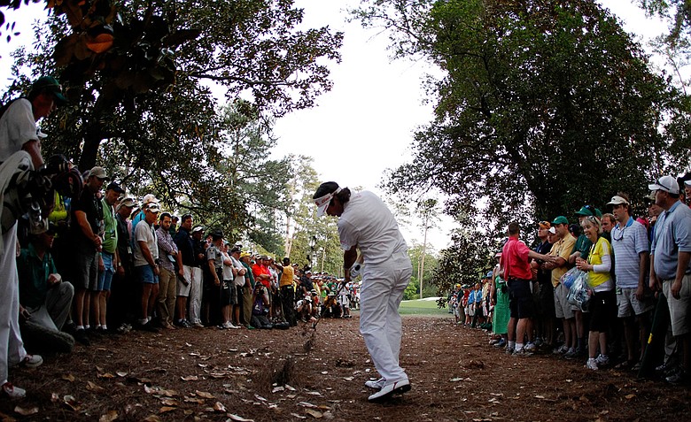 Bubba Watson hits a gap wedge from just over 160 yards out of the straw during the second hole of a sudden-death playoff. Watson would land the improbable shot on the green and he two-putted to win the Masters.