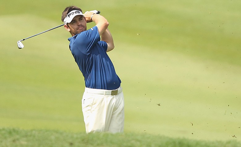 Louis Oosthuizen, a week after losing on the second hole of a playoff at the Masters, won the Malaysian Open by three strokes.