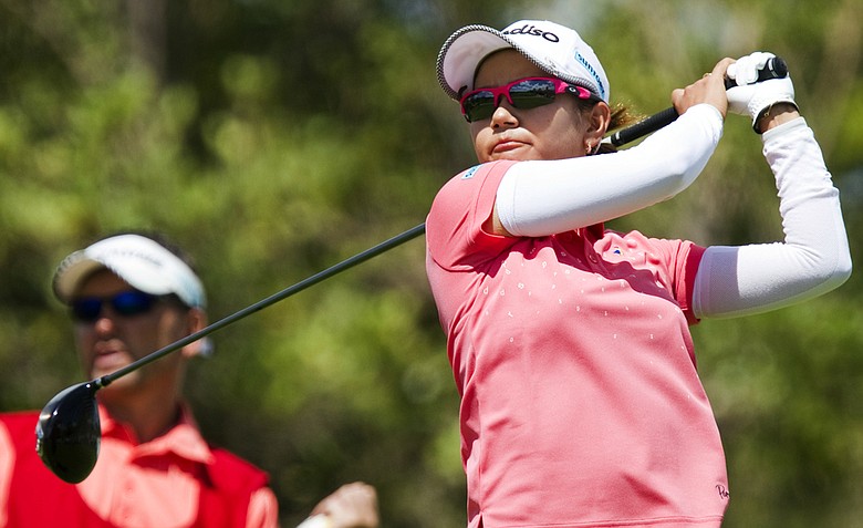 Ai Miyazato, of Japan, watches her drive of the second tee in the third round of the LPGA LOTTE Championship.