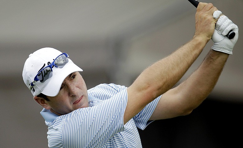 Ben Curtis watches his drive on the 17th tee during the second round of the Texas Open.