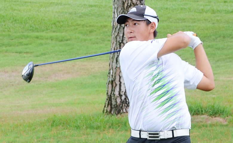 Carl Yuan, 15, on the first tee during the U.S. Open local qualifier on Thursday at Timacuan Country Club.