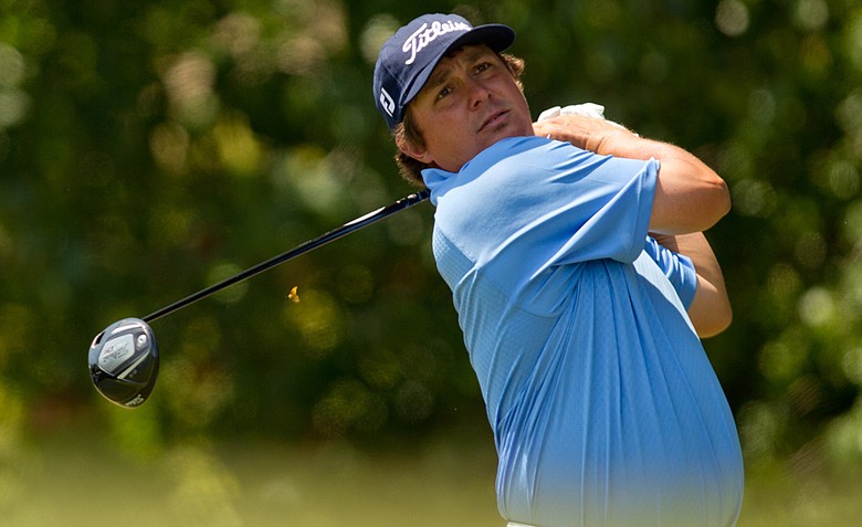 Jason Dufner plays a tee shot at the first hole during the final round of the HP Byron Nelson Championship at TPC Four Seasons Resort.