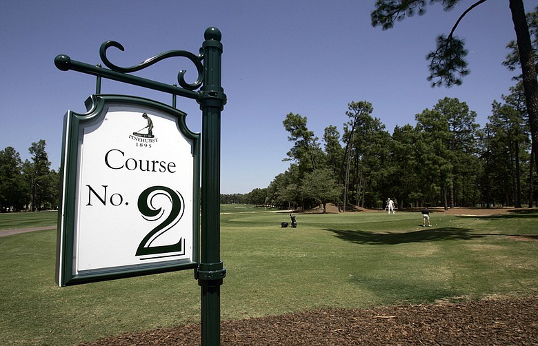 This April 23, 2007 file photo shows a sign identifying the Pinehurst No. 2 golf course at the Pinehurst Resort and Country Club in Pinehurst, N.C. In just over two years, Pinehurst's renowned No. 2 course will play host to the U.S. Open and U.S. Women's Open on consecutive weeks – the first time the USGA has attempted such a feat.