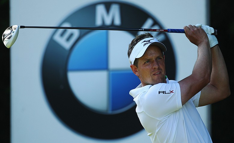 Luke Donald hits his tee shot on the 18th hole during the third round of the BMW PGA Championship on the West Course at Wentworth.