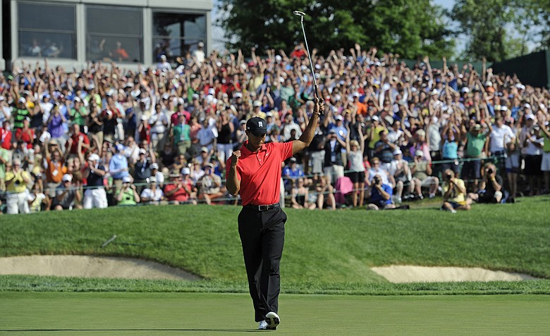 Tiger Woods reacts on the 18th green after winning the Memorial Tournament presented by Nationwide Insurance at Muirfield Village Golf Club on June 3, 2012 in Dublin, Ohio.