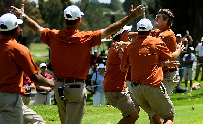 Dylan Frittelli runs toward his teammates after sinking his putt at No. 18 during the finals of match play. Texas defeated Alabama for the National Championship.