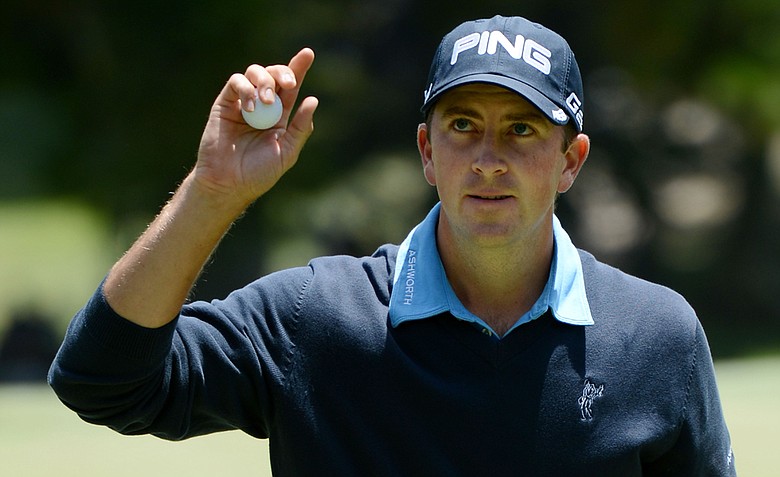 Michael Thompson of the United States waves to the gallery after a birdie putt on the 18th green during the first round of the 112th U.S. Open at The Olympic Club on June 14, 2012 in San Francisco, California.