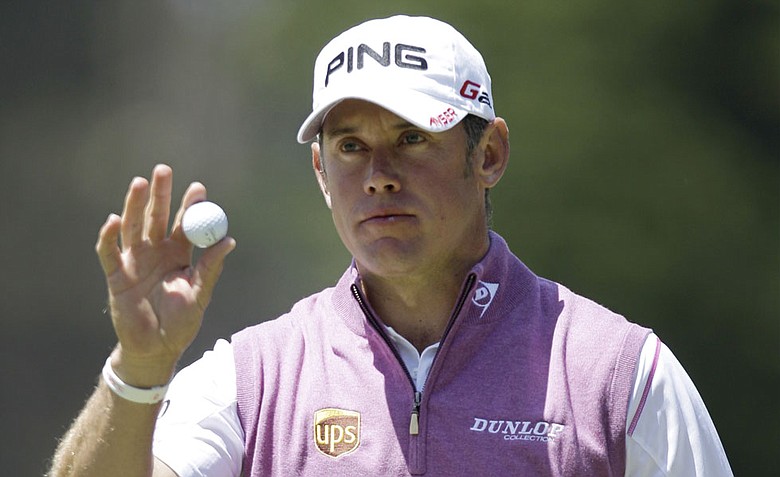 Lee Westwood, of England, reacts after making a birdie putt on the fifth hole during the third round of the U.S. Open Championship.